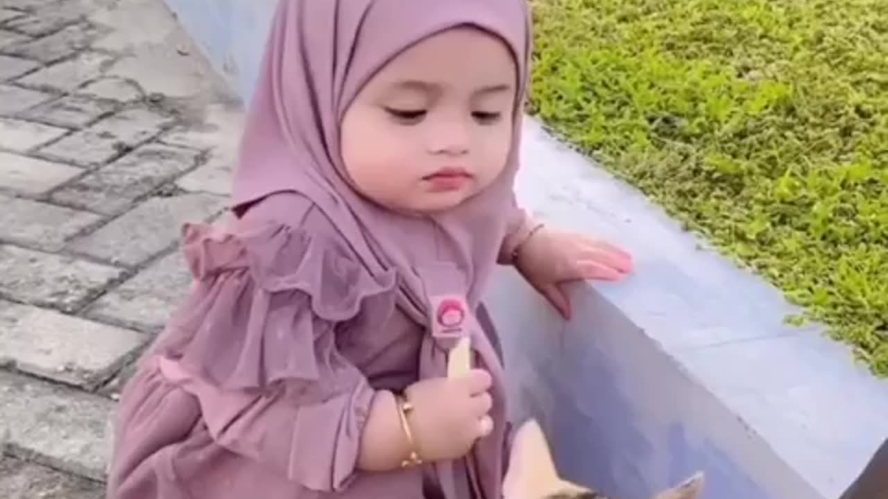 Cute baby girl playing with Cute cat