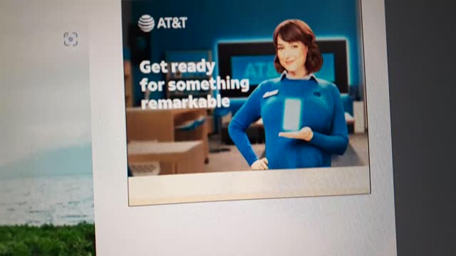 AT&T gal ad a bit flashy on her boobs.