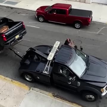 MAN TOW A TRUCK AND THE CAR DESTROYED SEVEN CARS