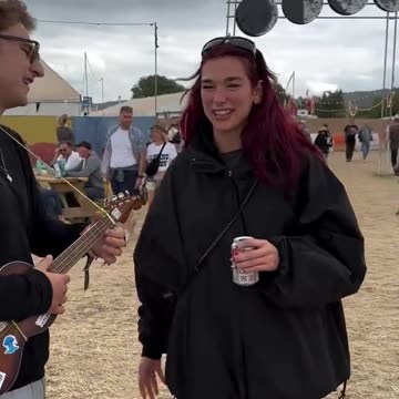 Dua Lipa's reaction to a ukulele busker performing to her goes viral