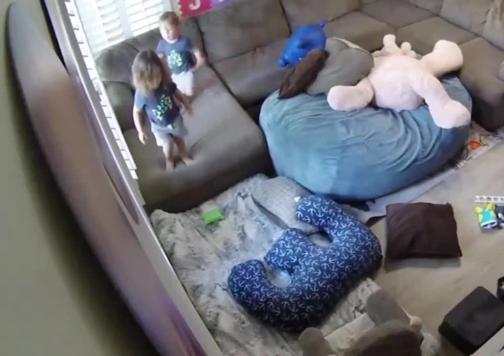 Toddler Pushes His Brother Off The Couch And Jumps Over Him