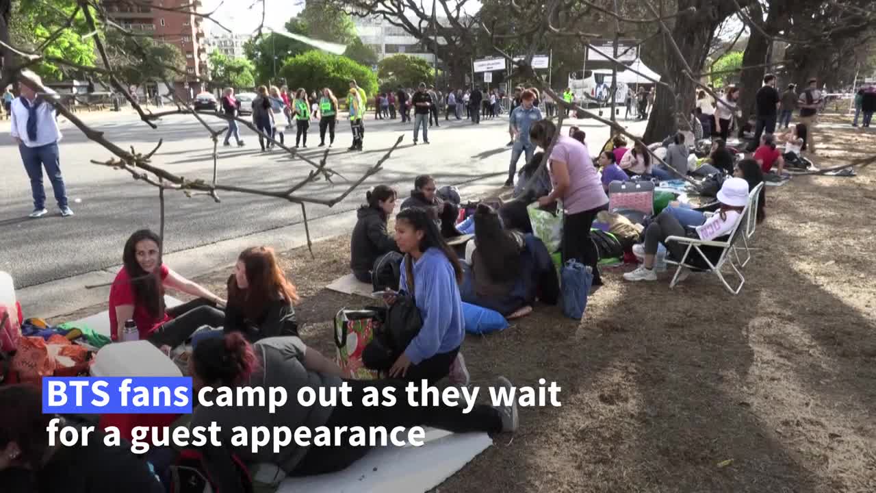 BTS fans camp out to see superstar Jin perform with Coldplay | AFP