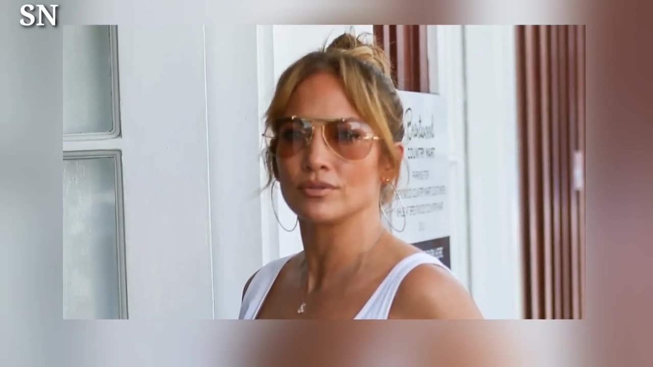 Jennifer Lopez Shines in Silver as She Performs Some of Her Hits at a Restaurant in Italy