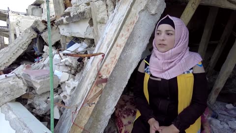 White Helmet female volunteer rescues quake survivors