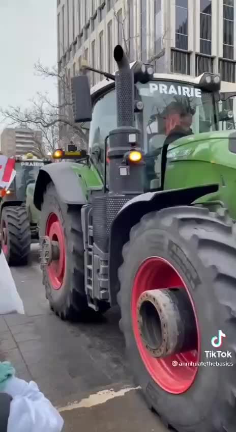Tractors Protesting with the Truckers