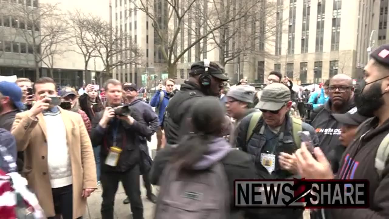 Rep George Santos swarmed by media scrum outside Trump indictment.