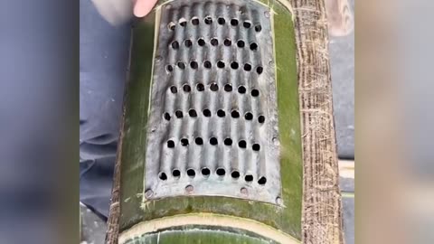 Making a hand planer from bamboo by a skill.