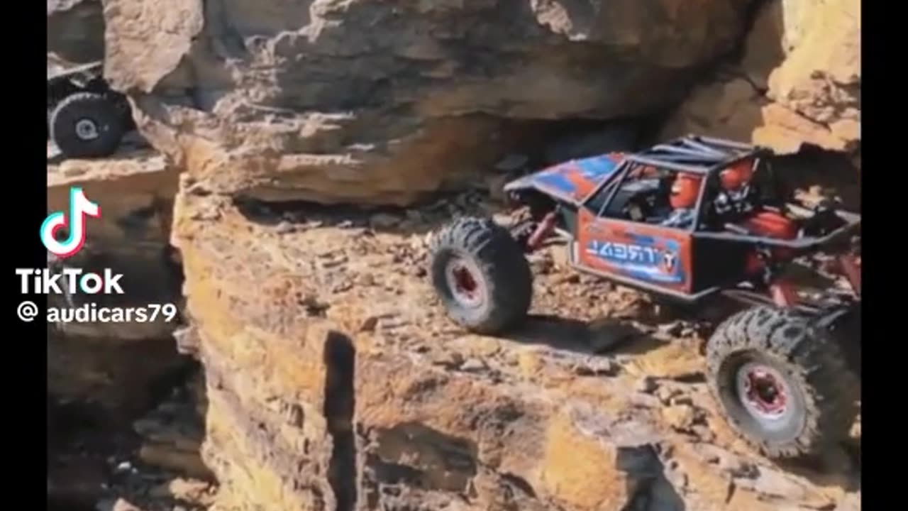 A truck climbing on huge ROCK