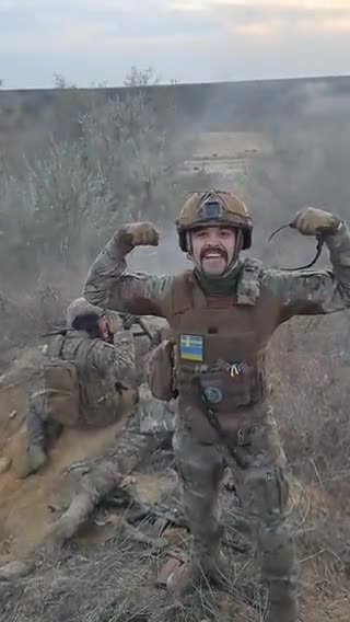 Swedish nazi mercenary in Ukraine with Nazi SS Totenkopf on the back of his helmet.