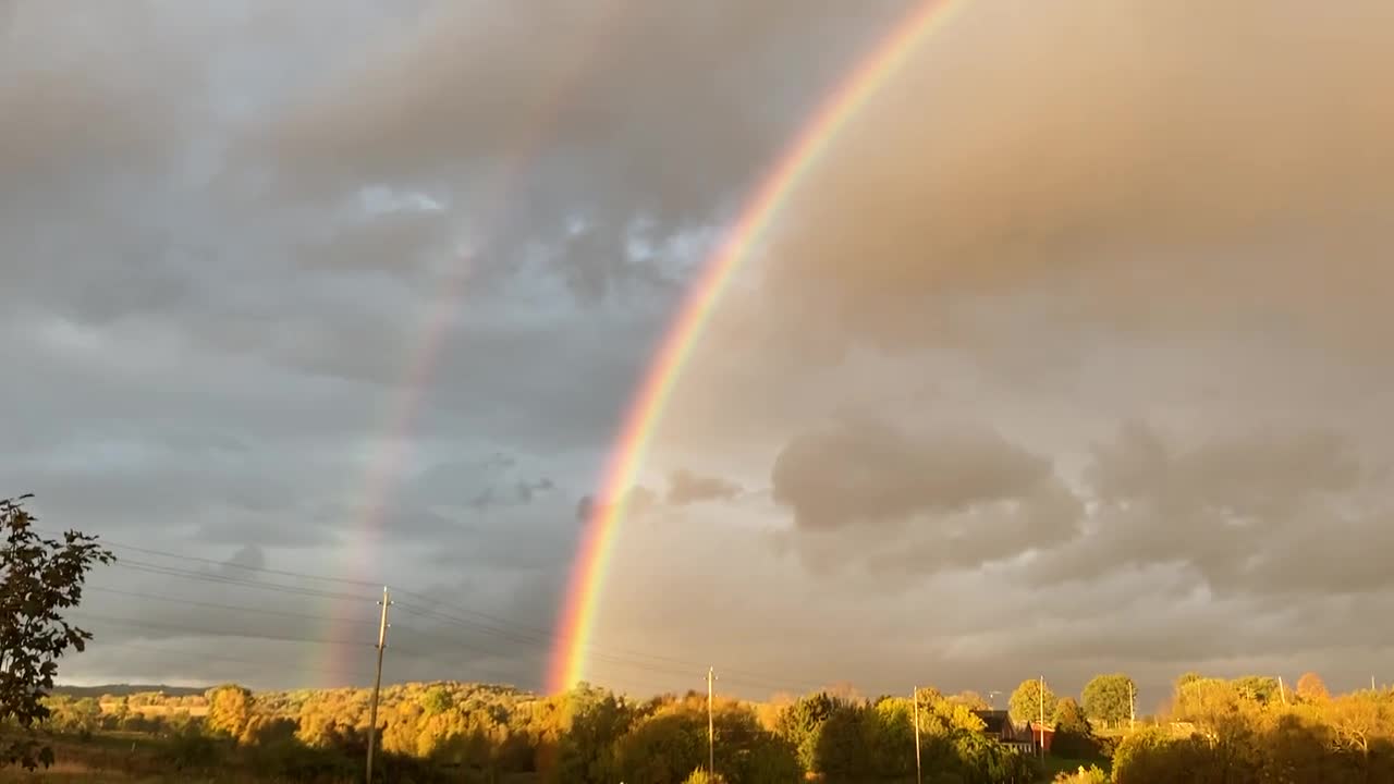 Video of the Complete Arc of a Double Rainbow Showing Both Ends of Both Arcs