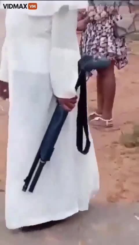 Priest Is Doing Service Locked And Loaded After Muslims Slaughtered 200 Christians In Nigeria