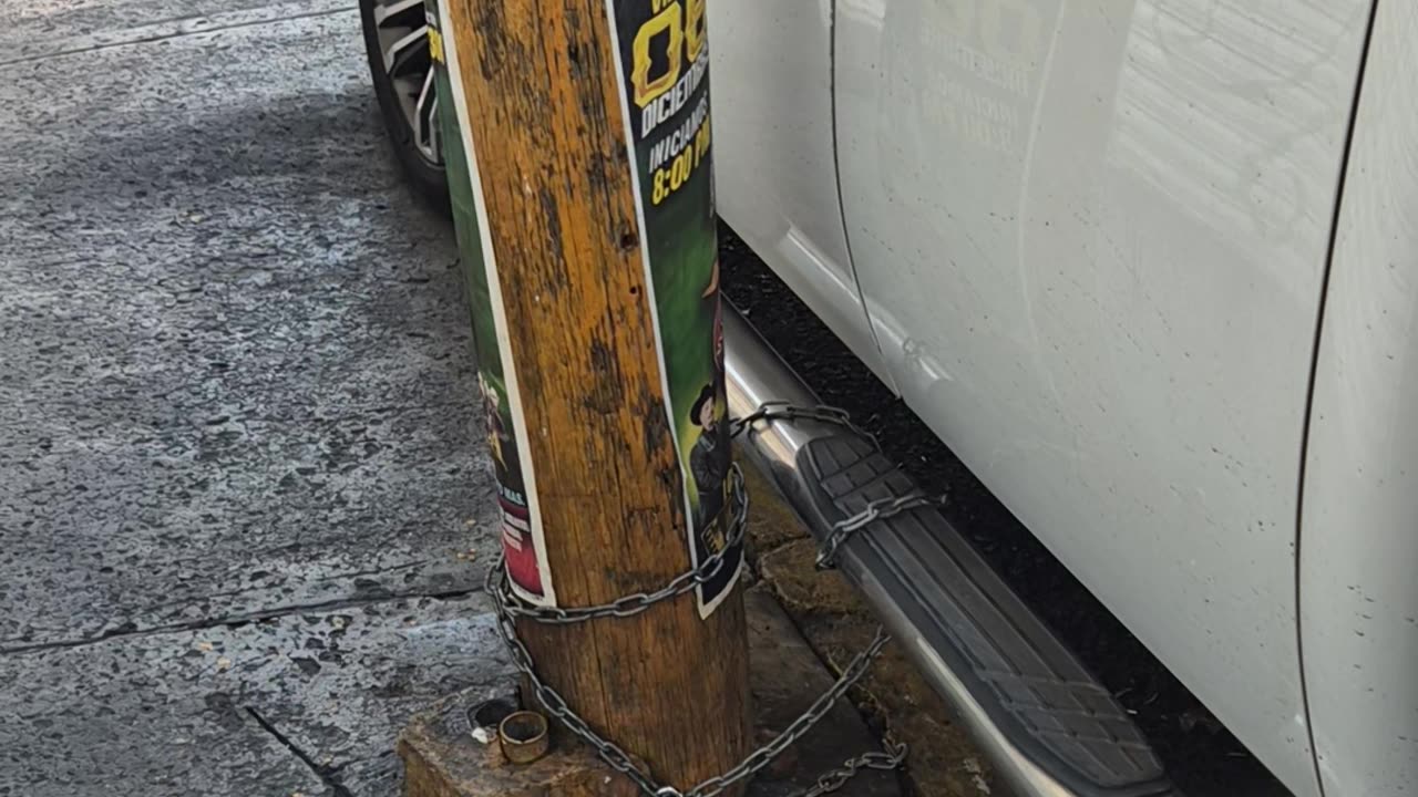 Truck Chained To Pole