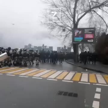 The security forces set up a cordon on one of the central streets of Almaty