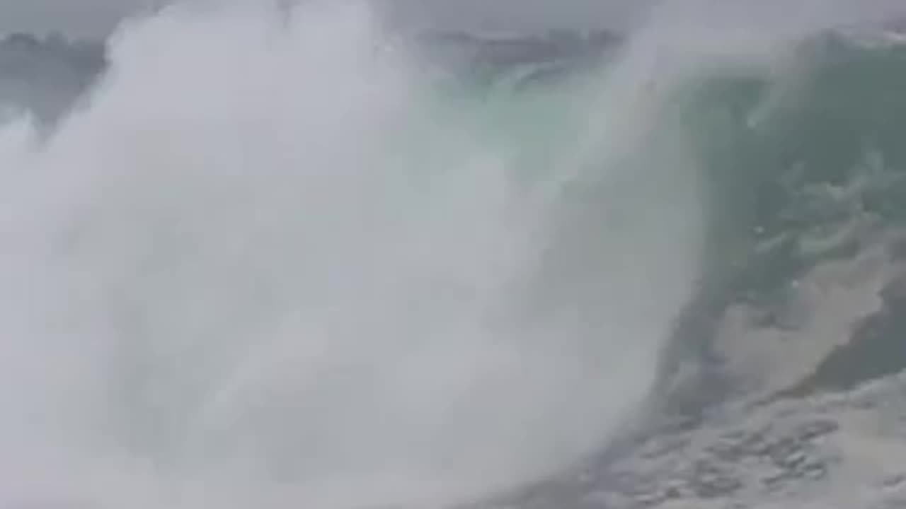 Crazy footage of surfers in Newport Beach, California during Hurricane Hillary