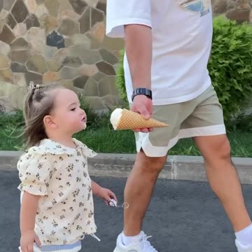 Cute kid having a nice time with her ice cream
