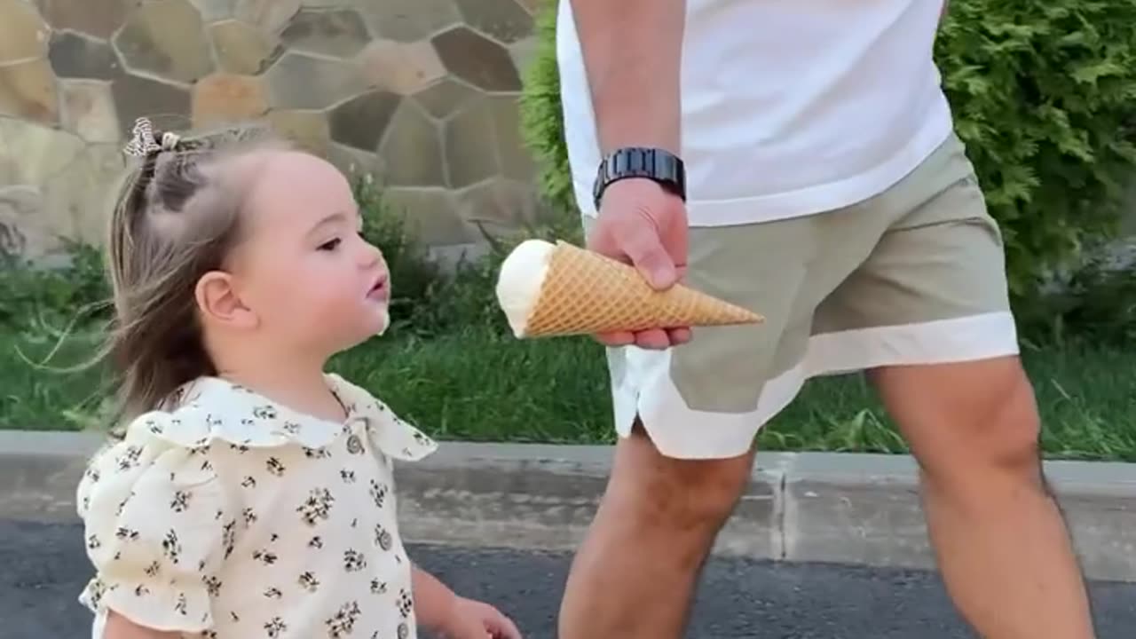 Cute kid having a nice time with her ice cream