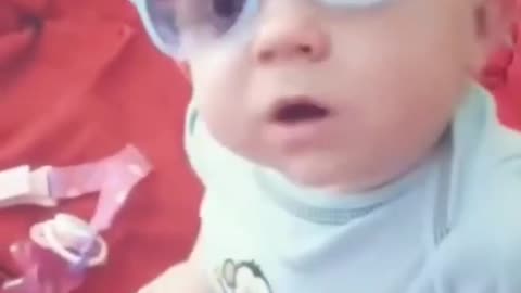 cute baby wearing glasses