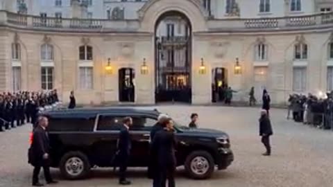 President-elect Trump arrives at the Élysée Palace and is welcomed by Macron.