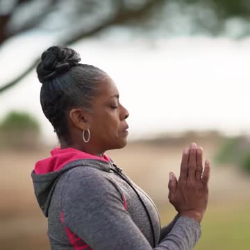 An Elderly Woman Doing a Yoga Pose
