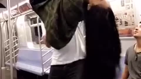 Girl tries to do backflip from rails in subway falls and hits head