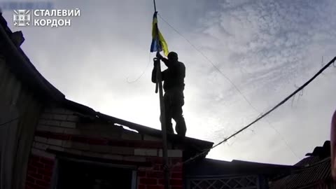 In the village of Topoli in the Kharkiv region, a blue and yellow flag was raised