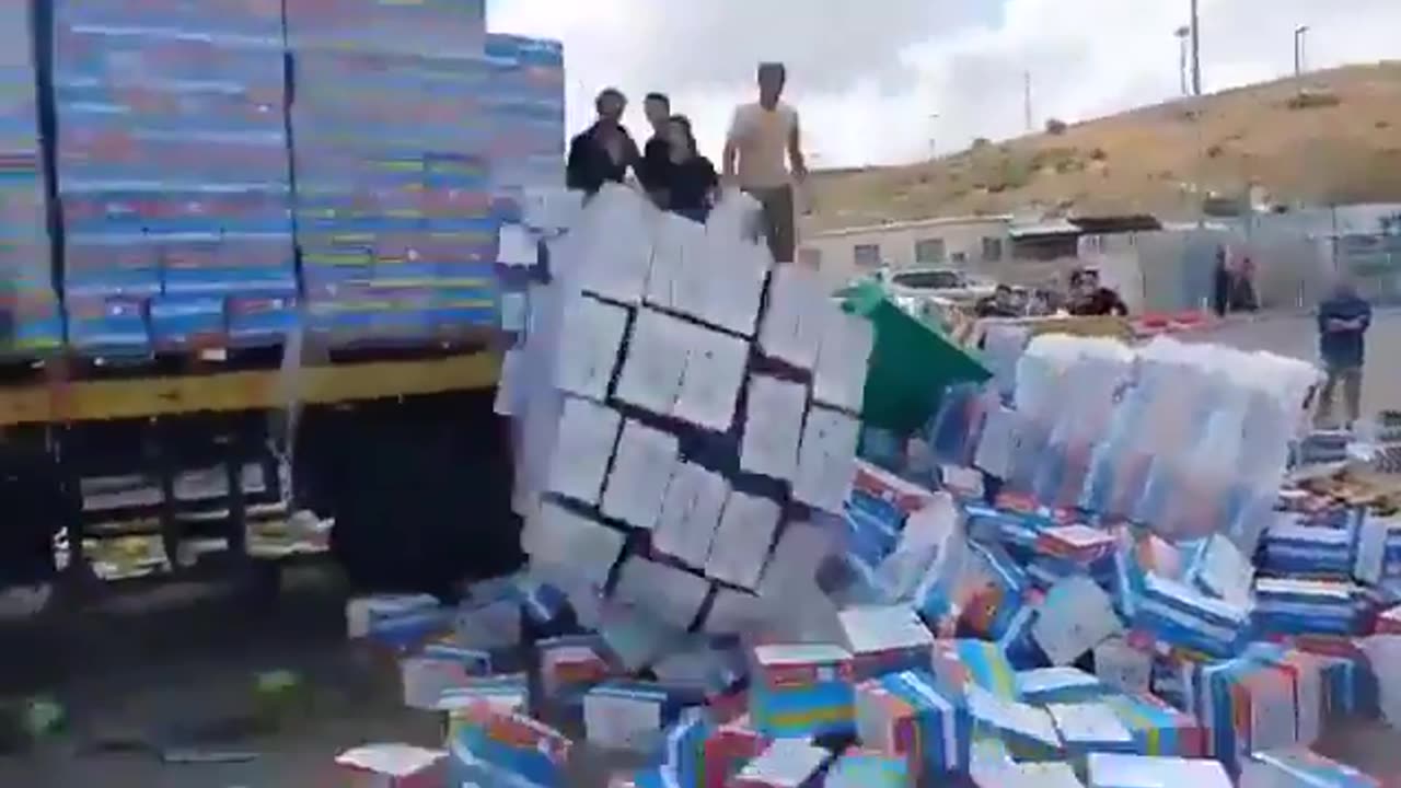 Israeli settlers (Evil-minded gangs) looted aid trucks traveling from Jordan to Gaza.