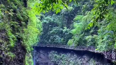 Green mountains and clear waters surround it