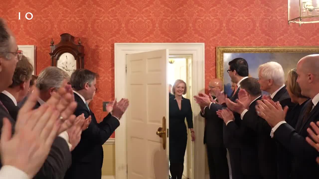 Outgoing UK PM Truss exits Downing Street following her farewell speech