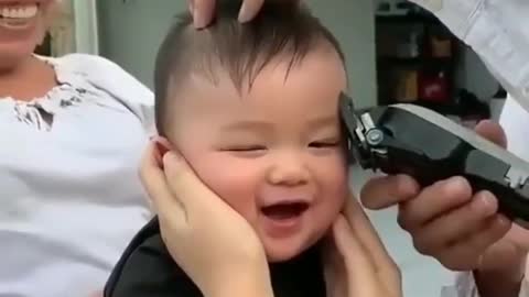 Adorable baby's heartwarming reaction to haircut
