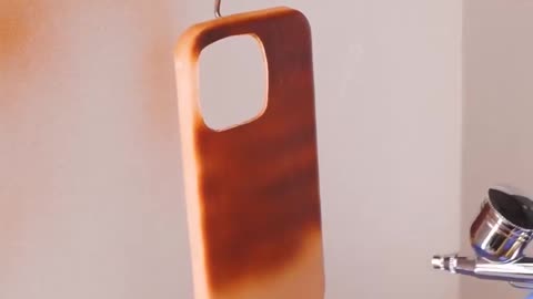 Experts craft fashionable metal and leather phone cases!