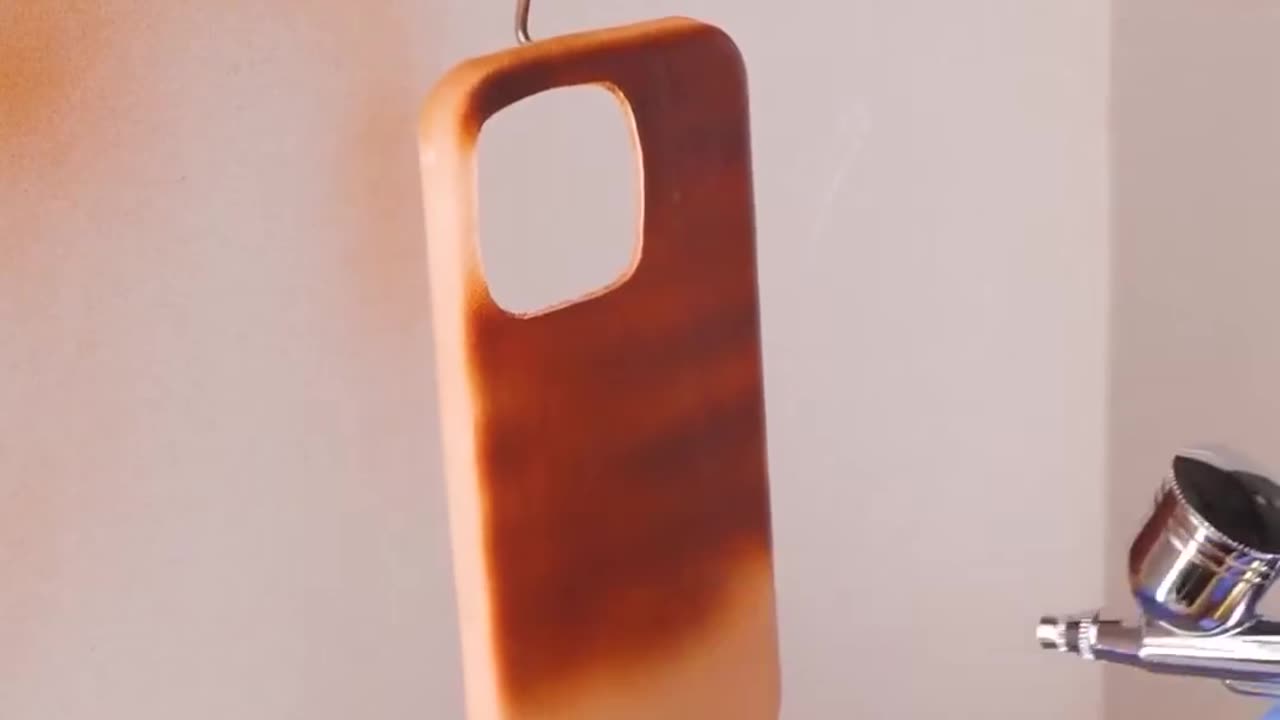 Experts craft fashionable metal and leather phone cases!