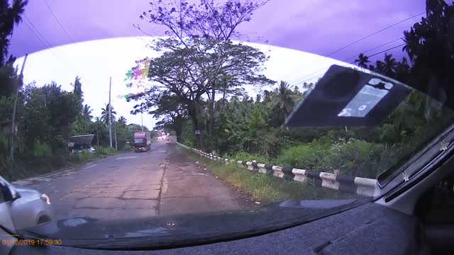 Bus Takes out Tricycle