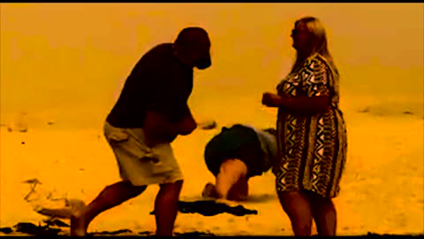 Photographer Keeps Falling While Trying to Record Proposal
