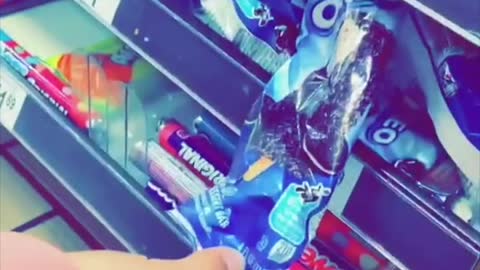 Cashier Restocks Freezer With Melted Ice Creams