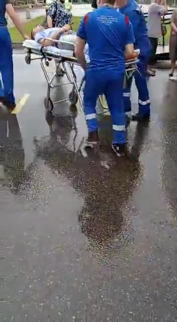 Stretchered Out After Vaccination