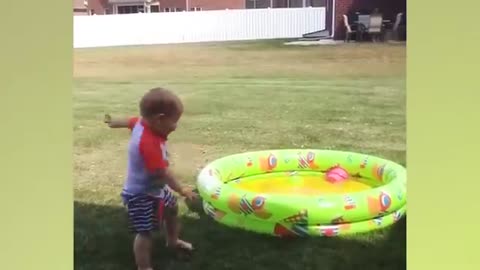 Babies playing with water