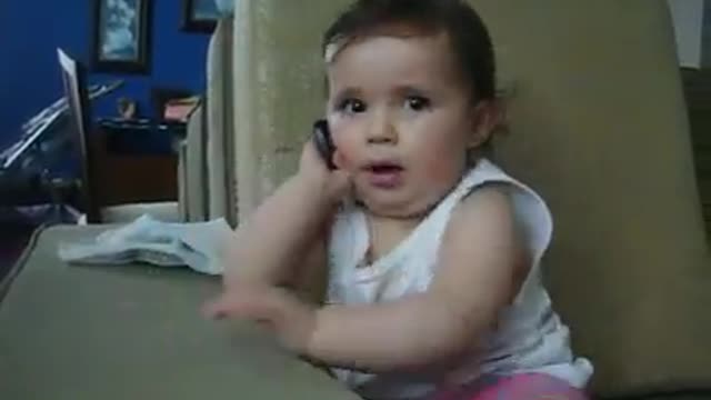 Baby Pretends Talking in Mobile