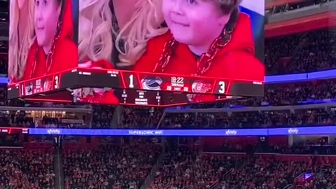 Watch the crowd go wild for this young Red Wings fan