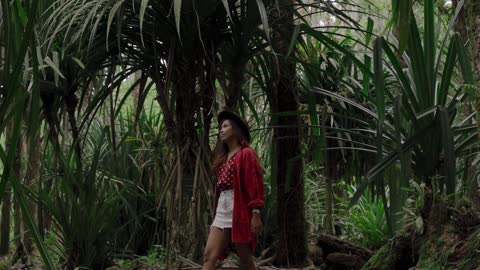 Woman Wandering Around in the Middle of the Forest