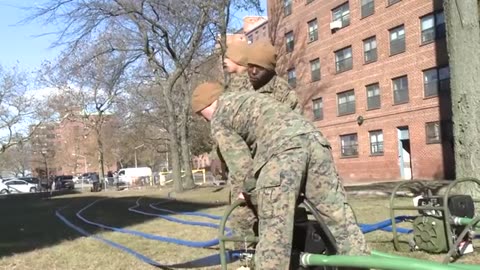 Marines Help Pump Out Flood Water from Hurricane Sandy