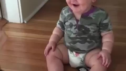 baby laughing hysterically at mom's sunglasses trick #shorts