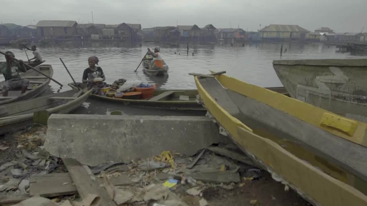 Woman Sat In Boat Nigeria 01