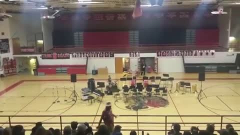 PEOPLE PLAYING THE PH THEME IN SCHOOL