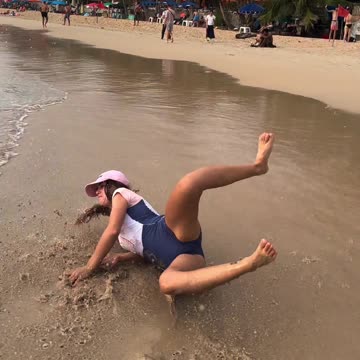 Girl fails on surf