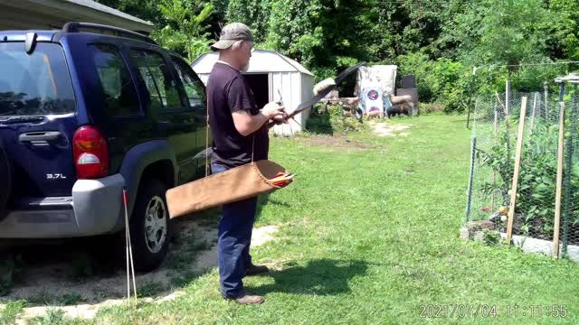 home made leather arrow bag and tied on fletching's