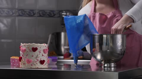 Putting cream in a piping bag