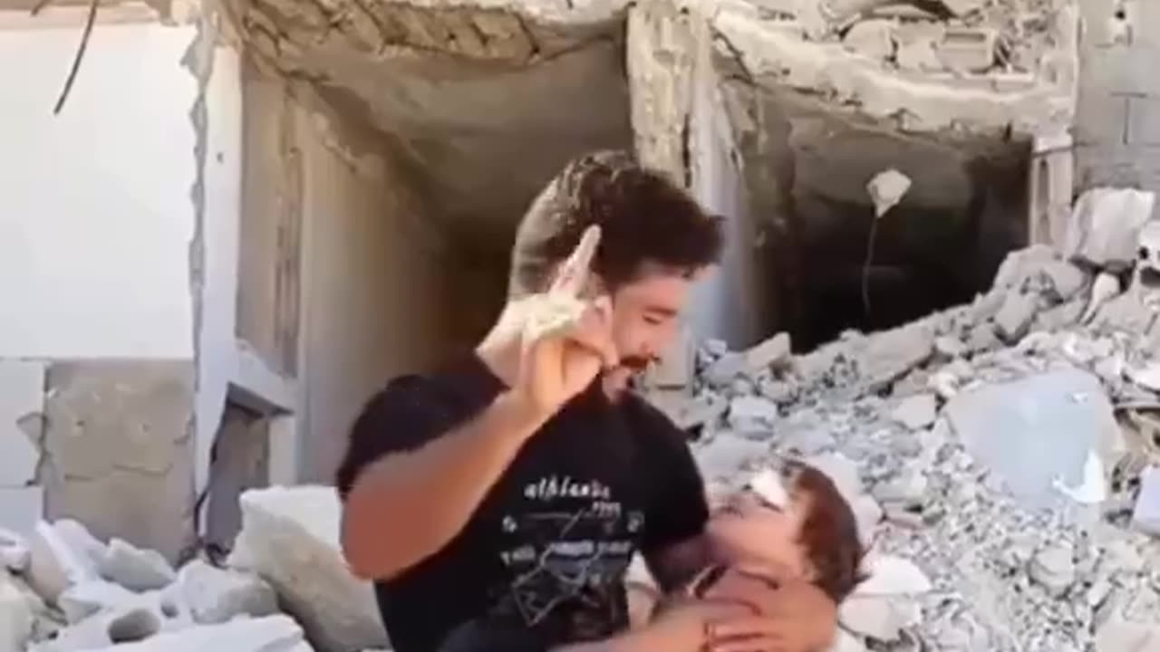 A Palestinian father cries for his dead son whose leg suddenly itches.