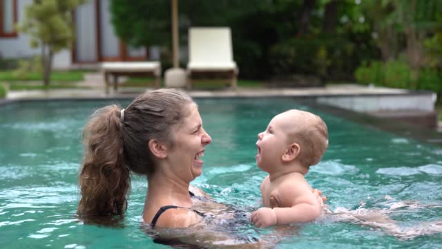 Funny Babies Swimming In The Pool - Baby Outdoor Moments