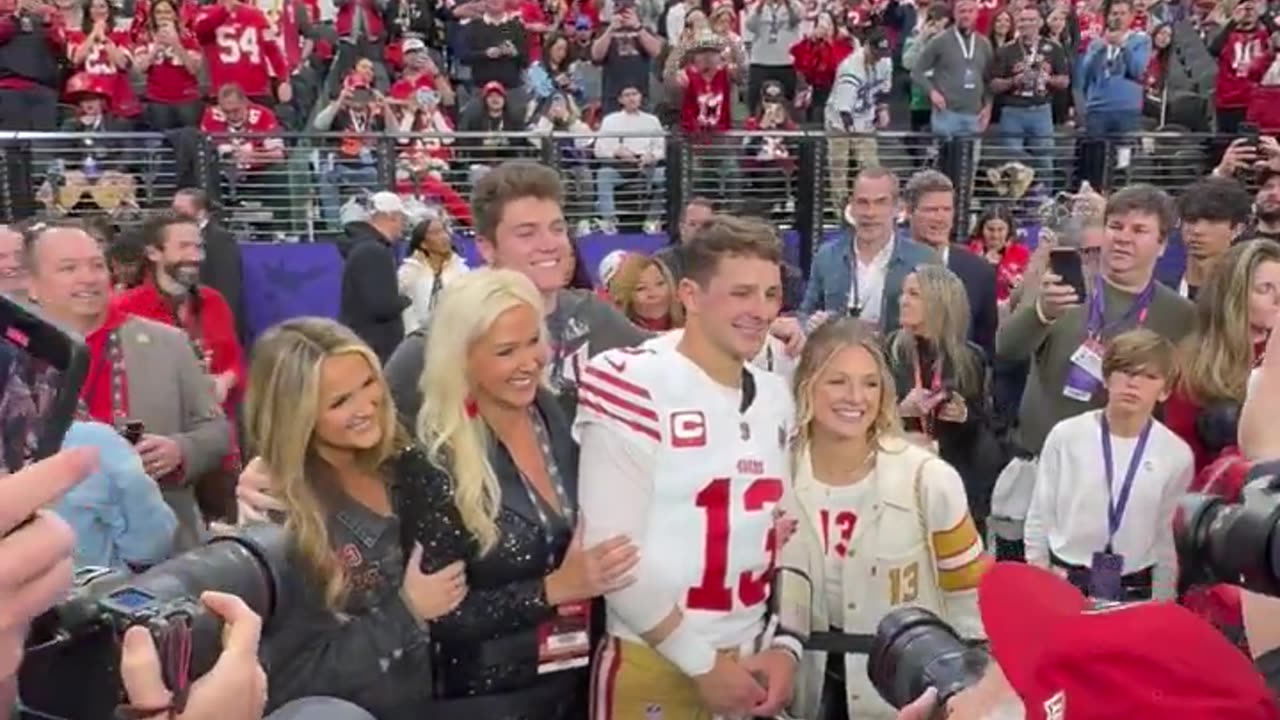 NFL Purdy and family pose before the finals