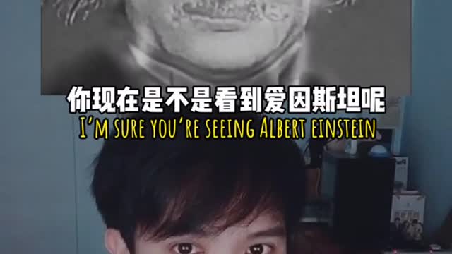 Who do you see in the photo? Albert Einstein?